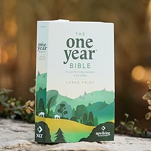 The One Year Bible NLT (Softcover): The Entire Bible in 365 Readings in the Clear and Trusted New Living Translation Paperback – Unabridged